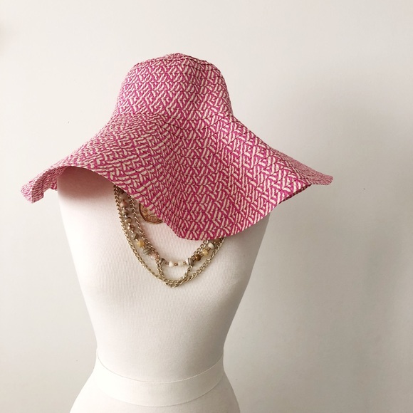 big pink floppy hat